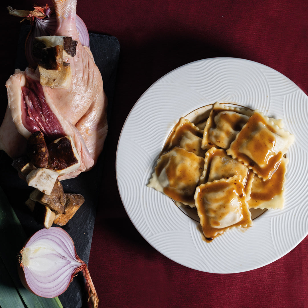 Raviolis canard confit cèpes, jus de canard cèpes