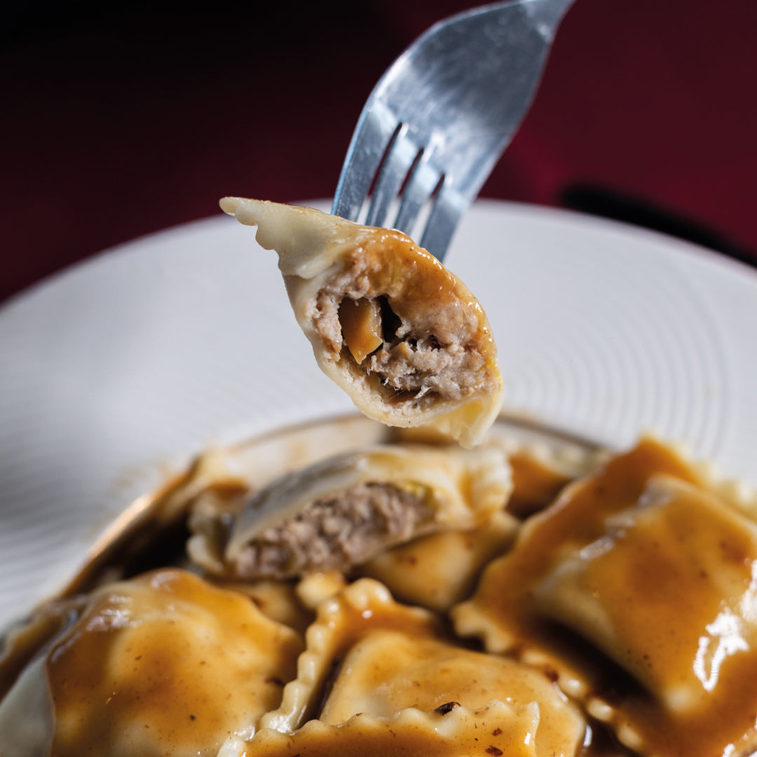 Raviolis canard confit cèpes, jus de canard cèpes